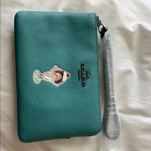 Coach corner zip wristlet. Ice cream motif.
